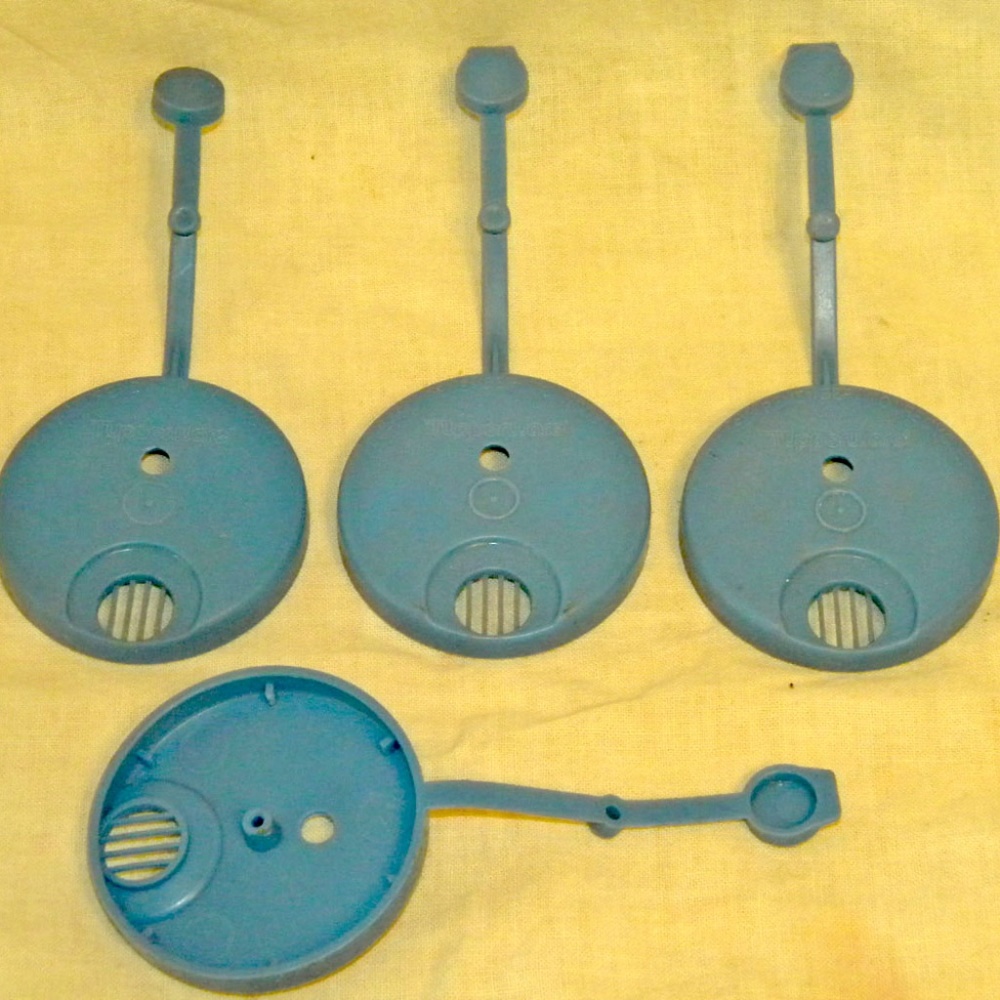 4 – Tupperware brand 2 1/4 inch diameter blue lids
